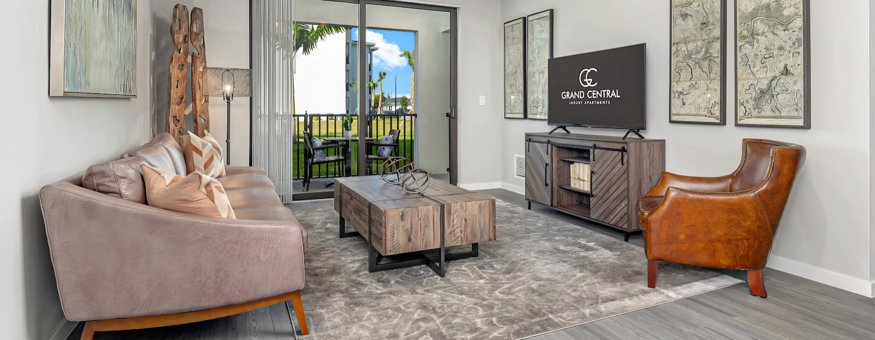 a living room with a couch and a tv