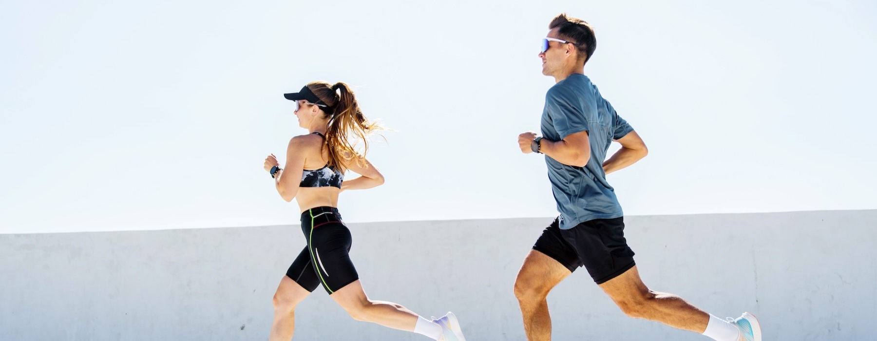 a man and a woman running